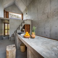 Interior casa tiny with concrete table kitchen