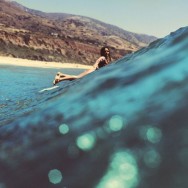 surfer-on-leo-carrillo-beach-malibu-california