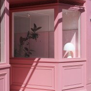 The cafe sits behind a period timber shopfront. The facade was stripped back from the later additions to reveal the original features, including the ornate cast iron grilles.