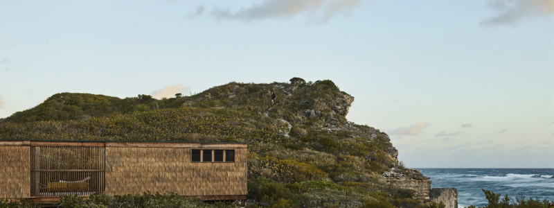 The Thatch house, perched on a cliff.