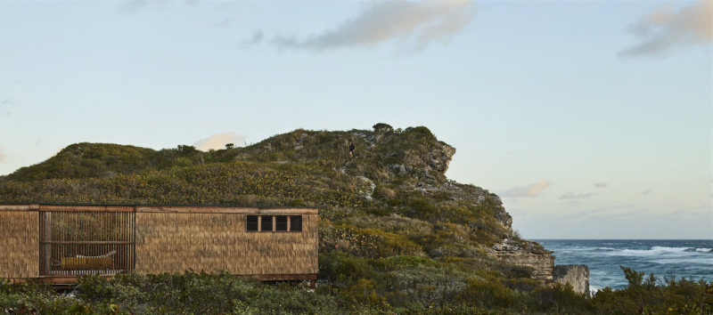 The Thatch house, perched on a cliff.