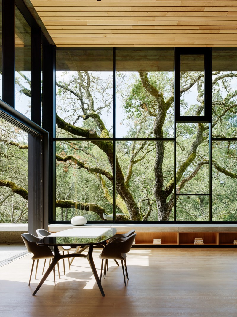 American studio Faulkner Architects has created a family residence clad in Corten steel panels and shaded by large oak trees.