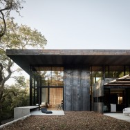 "This bridging between interior and exterior is major feature of the main living space, and an entire wall is devoted to connecting the two visually," the studio said.