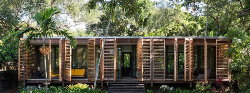 Wooden shutters wrap around this Miami home.