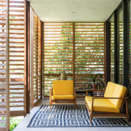 Inside, Brillhart Architects has contrasted the house’s glass walls with various types of wood, including reclaimed cherry, oak and red cypress.